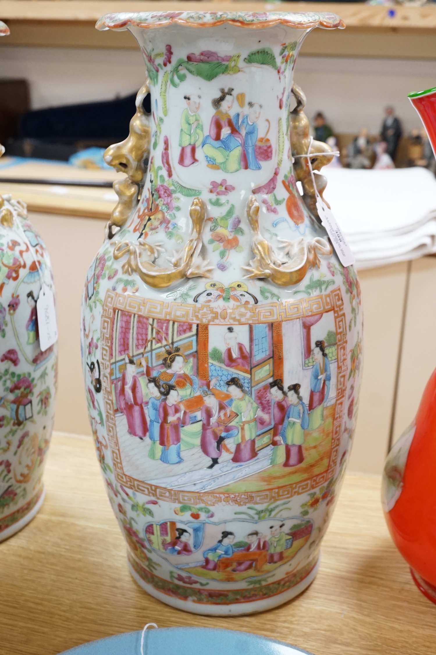A large pair of 19th century Chinese export famille rose vases, 45cm (a.f.)